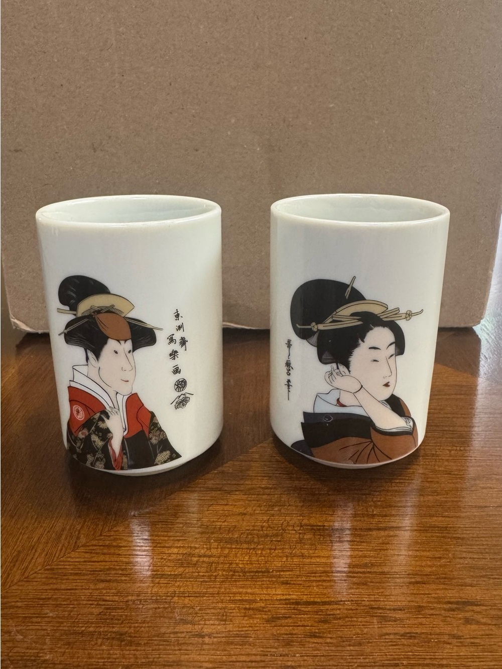 Set of 2 Japanese Geisha Ceramic Tea Cups - White with Black, Red & Brown Art
